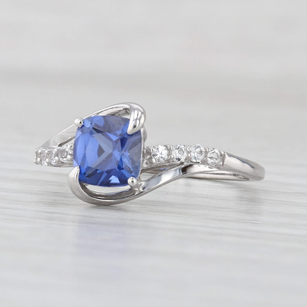 1.41ctw Lab Created Blue Sapphire White Topaz Ring 10k White Gold Size 7 Bypass