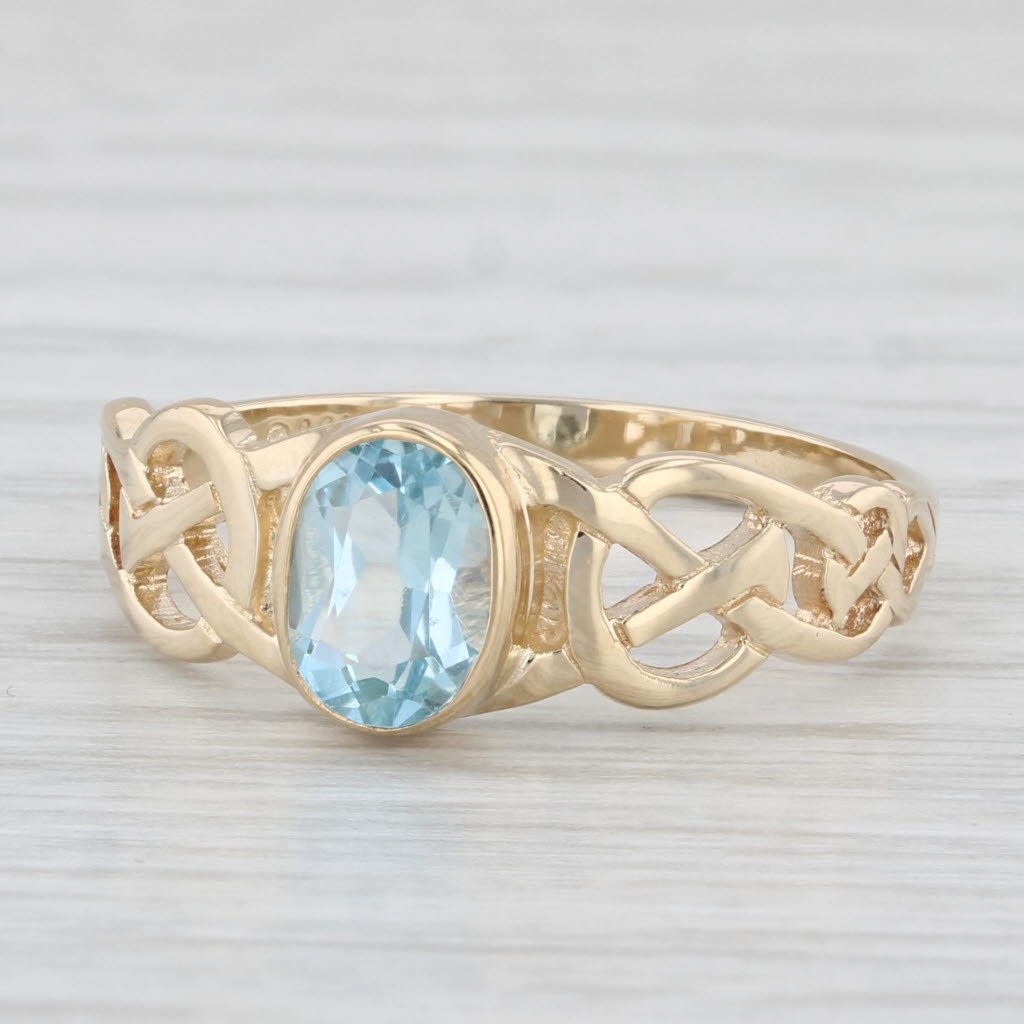 Light Gray 1ct Blue Topaz Knotwork Ring 14k Yellow Gold Size 8.25 Oval Solitaire