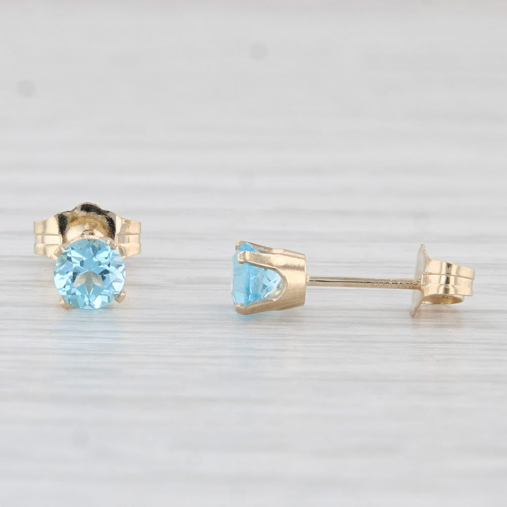 Light Gray 0.60ctw Blue Topaz Round Solitaire Stud Earrings 14k Yellow Gold