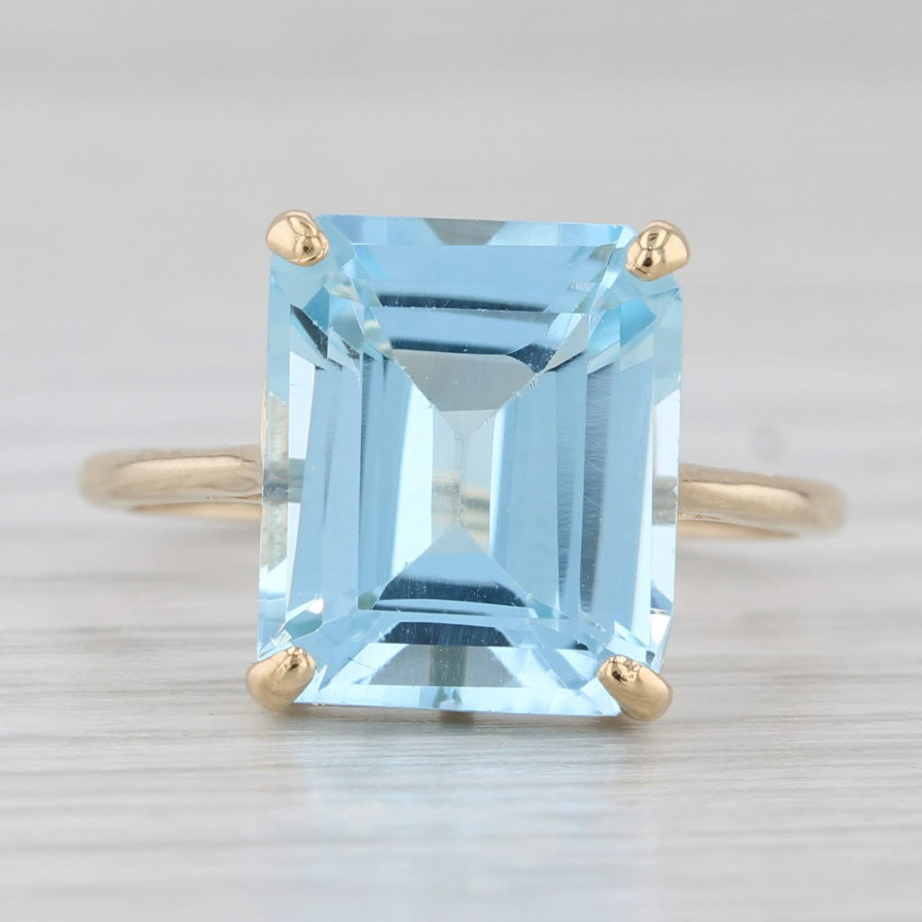 Light Gray 7.35ct Emerald Cut Blue Topaz Solitaire Ring 14k Yellow Gold Size 7