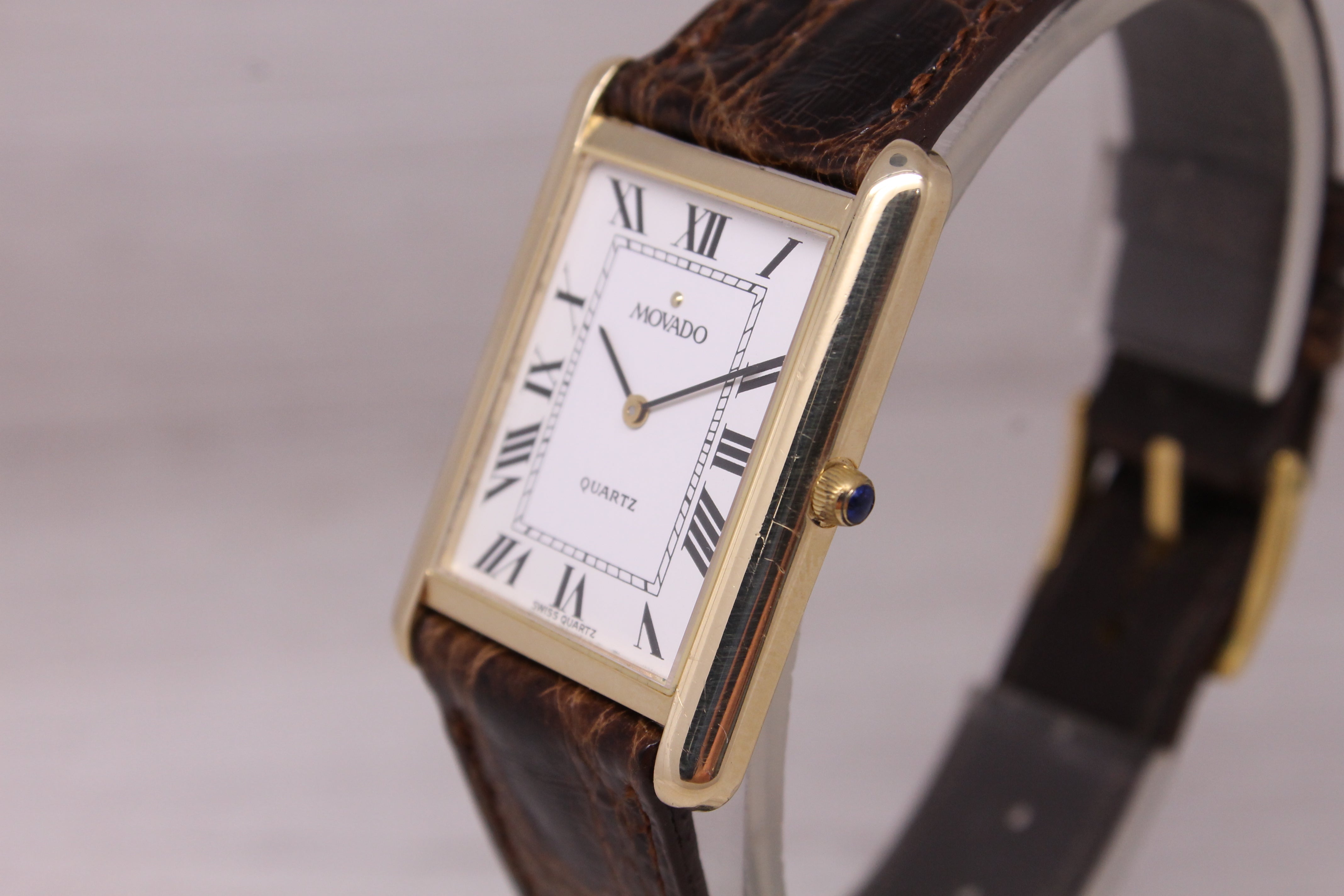 Vintage c.1990 Movado 14k Yellow Gold 25mm Tank Dress Watch Quartz Roman Dial