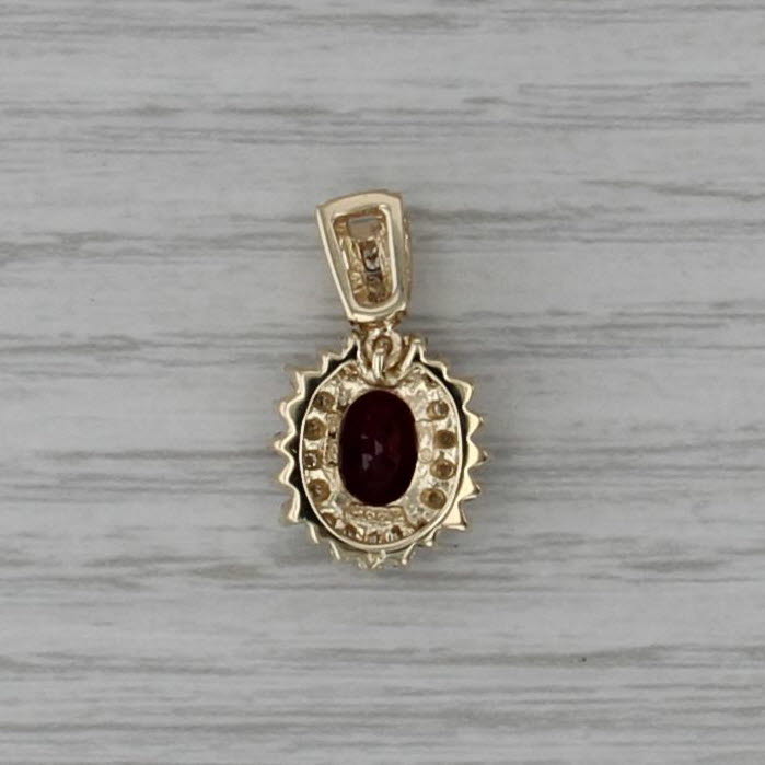 1.90ctw Oval Ruby Diamond Halo Pendant 14k Yellow Gold