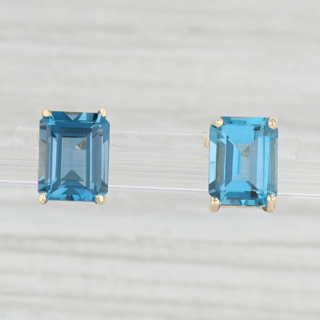 Light Gray 6ctw London Blue Topaz Solitaire Stud Earrings 14k Yellow Gold Emerald Cut Studs