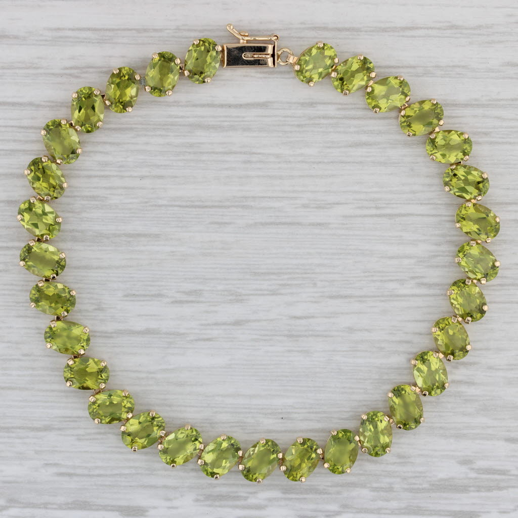 Gray 27ctw Peridot Tennis Bracelet 14k Yellow Gold 8" 7.1mm