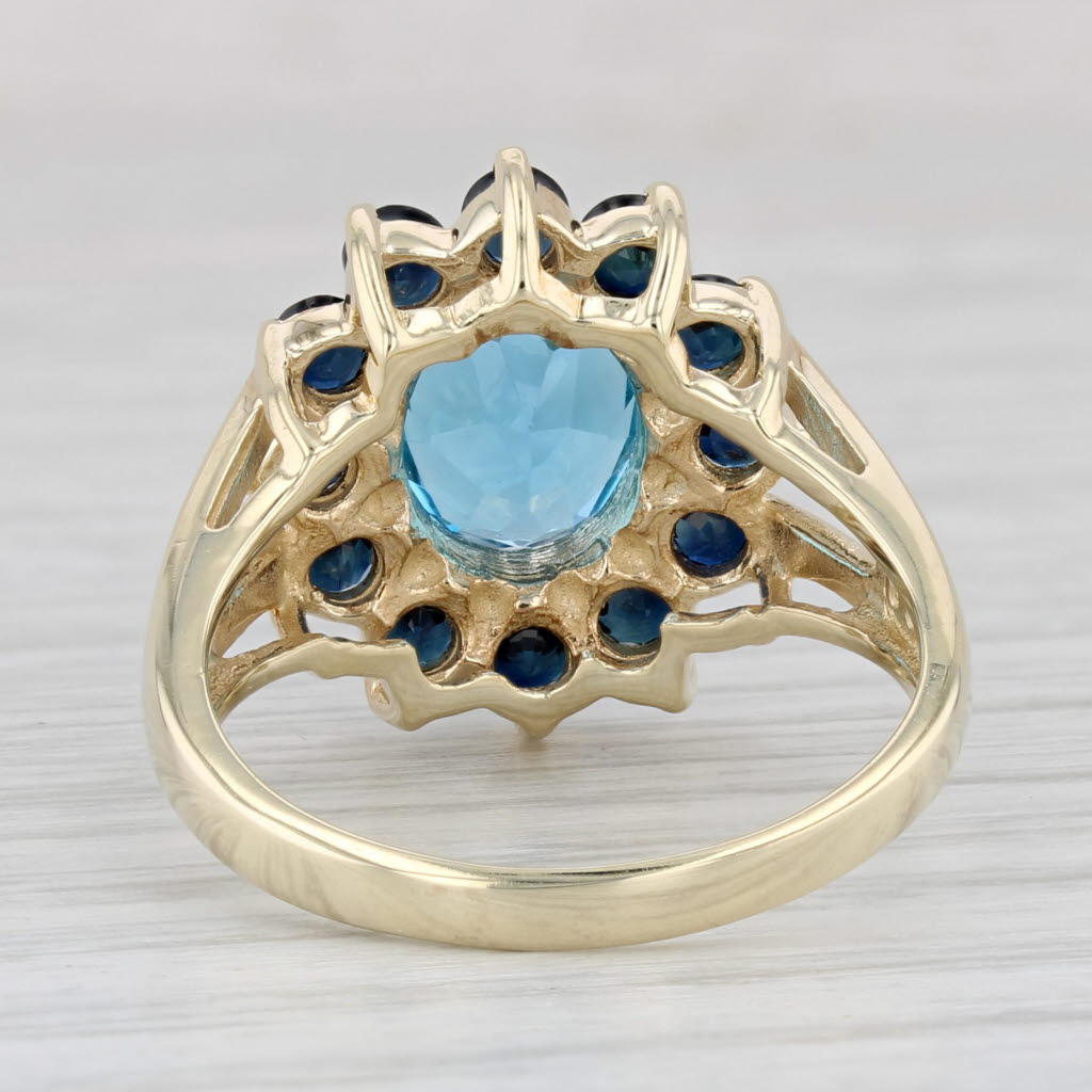 Light Gray 3.40ctw Oval Blue Topaz Sapphire Halo Ring 10k Yellow Gold Size 7