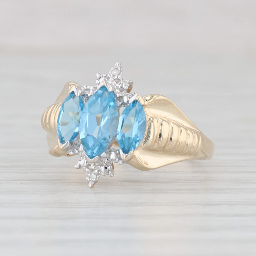 Light Gray 1.25ctw 3-Stone Blue Topaz Diamond Ring 10k Yellow Gold Size 7.25