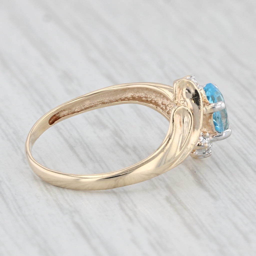 Light Gray 1ctw Oval Blue Topaz Diamond Ring 10k Yellow Gold Size 7.25