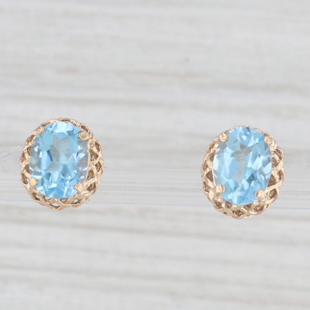 Light Gray 2.80ctw Oval Solitaire Blue Topaz Stud Earrings 10k Yellow Gold