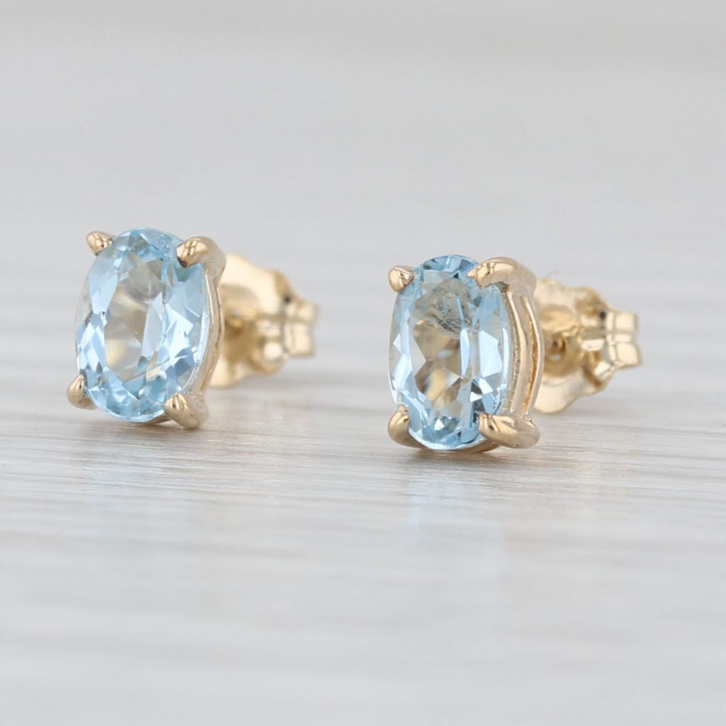0.80ctw Oval Aquamrine Solitaire Stud Earrings 14k Yellow Gold Studs