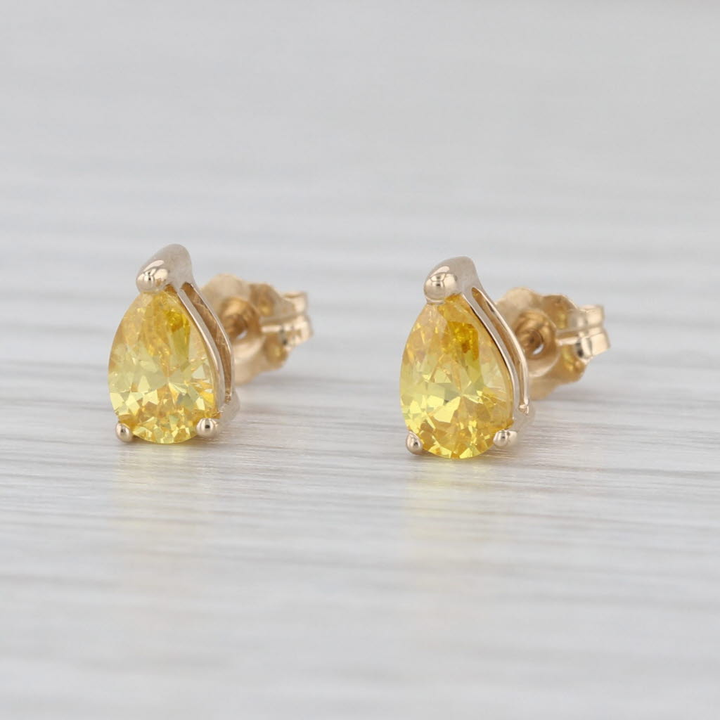 0.70ctw Yellow Cubic Zirconia Pear Stud Earrings 14k Yellow Gold Teardrop