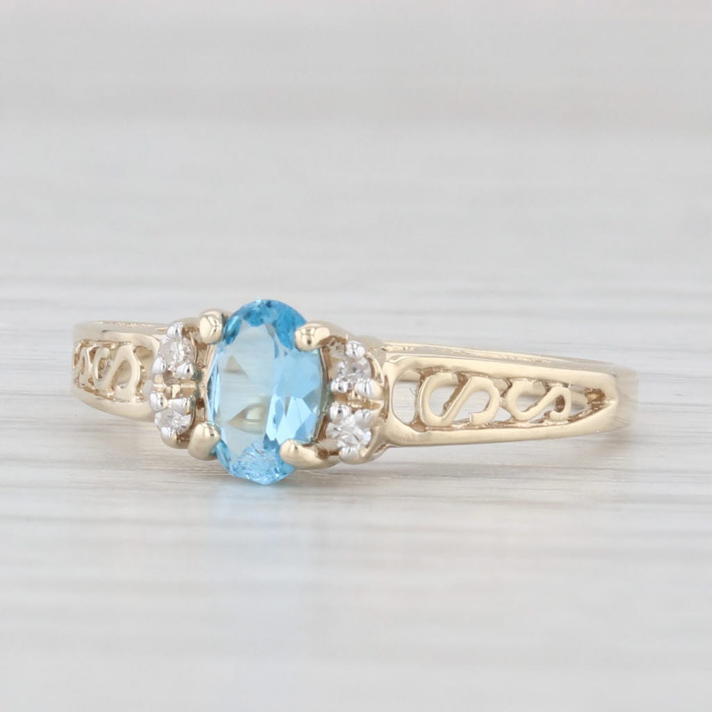 Light Gray 0.44ctw Oval Blue Topaz Diamond Ring 10k Yellow Gold Size 6