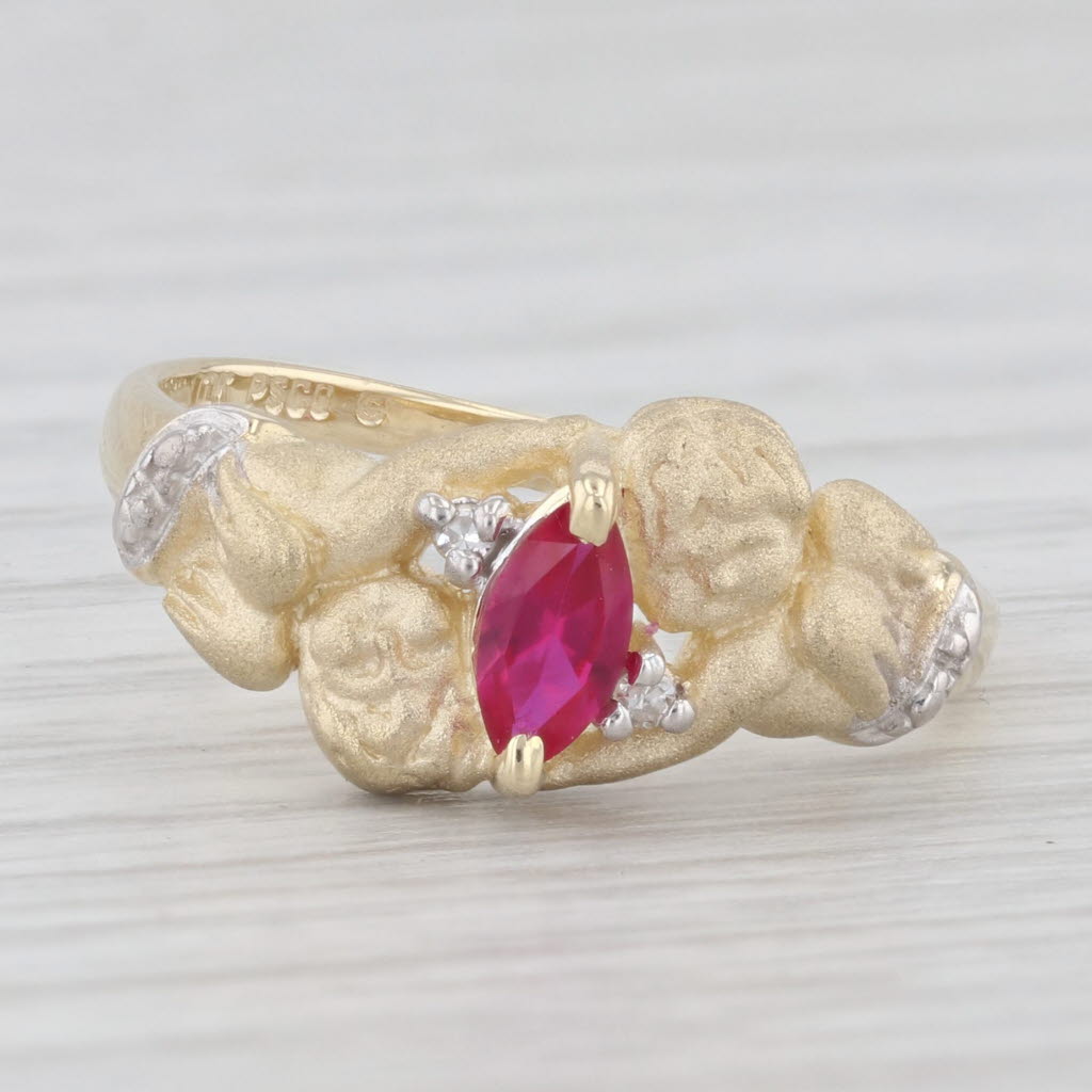 Light Gray 0.20ctw Lab Created Ruby Cherub Ring 10k Yellow Gold Diamond Accents Size 6.75