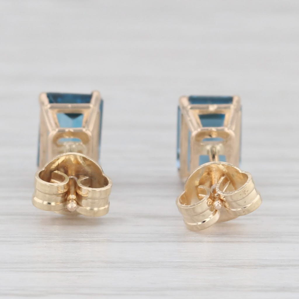 Light Gray 2.60ctw London Blue Topaz Stud Earrings 14k Yellow Gold Emerald Cut Solitaires