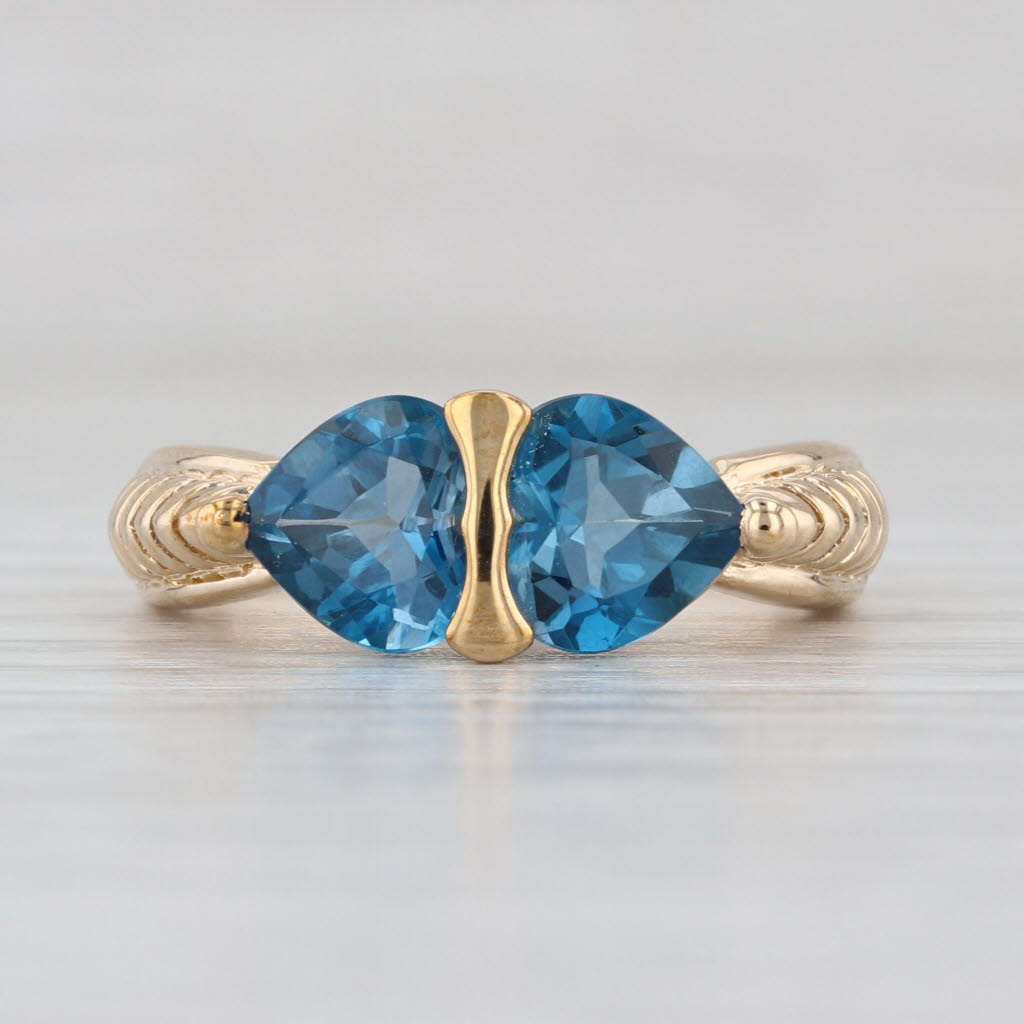 2.80ctw Blue Topaz Hearts Ring 10k Yellow Gold Size 7.25 Beveled Band