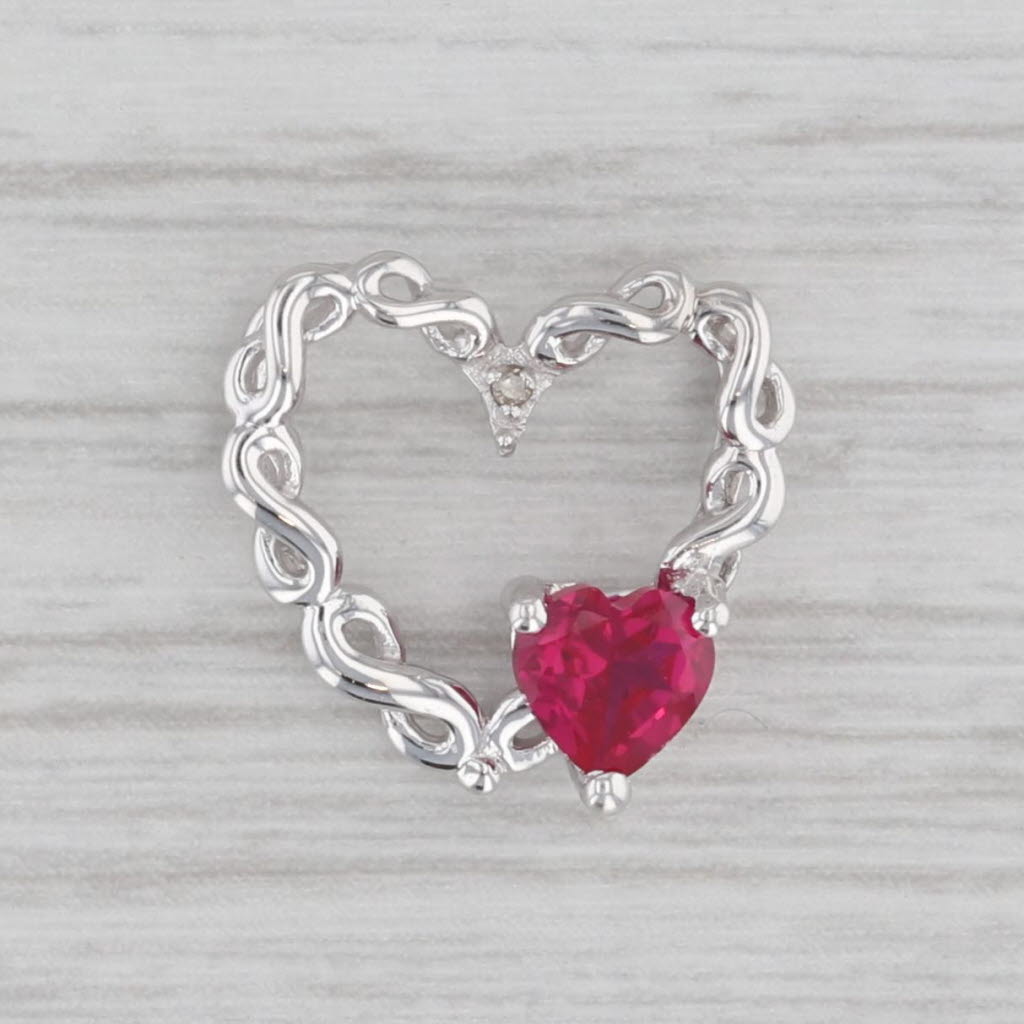 Gray 0.50ct Lab Created Ruby Heart Openwork Pendant 10k White Gold Diamond Accents