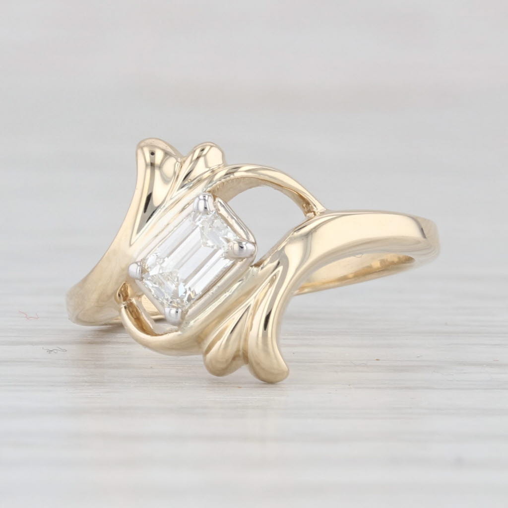 Light Gray 0.18ctw Emerald Cut Diamond Solitaire Bypass Ring 14k Yellow Gold Size 5