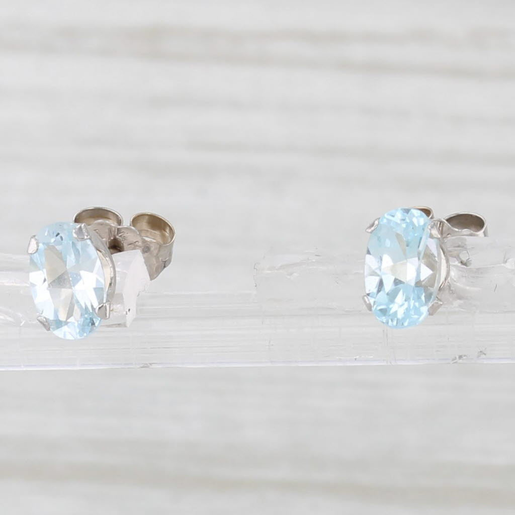 Light Gray 1.10ctw Oval Blue Topaz Solitaire Stud Earrings 14k White Gold