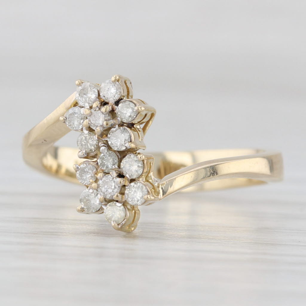 Light Gray 0.20ctw Diamond Flower Cluster Bypass Ring 14k Yellow Gold Size 7.25