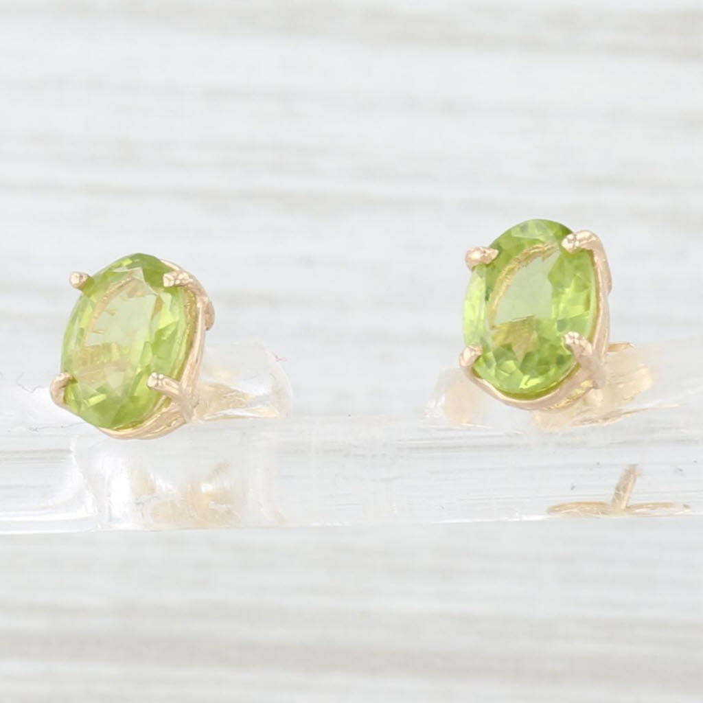 Lavender 1.50ctw Oval Solitaire Peridot Stud Earrings 14k Yellow Gold