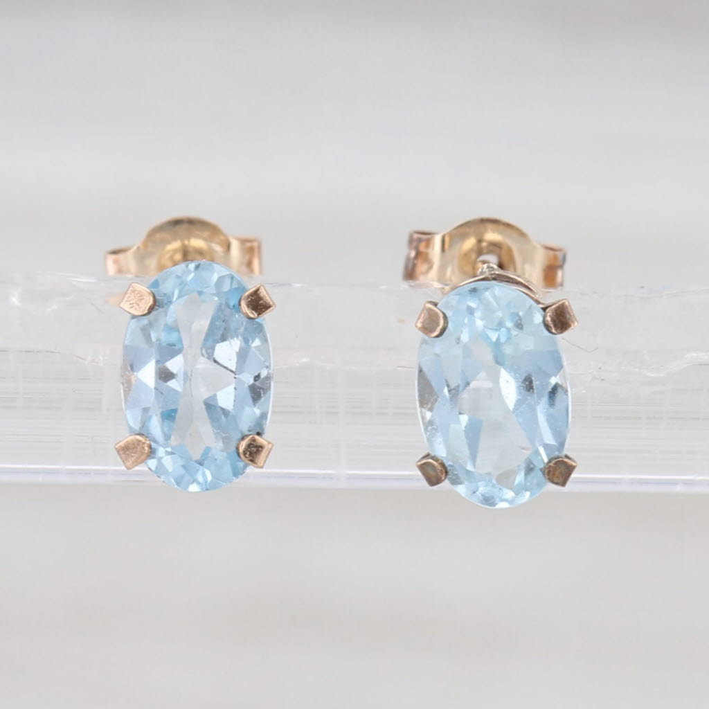1.18ctw Oval Blue Topaz Stud Earrings 10k Yellow Gold Solitaire Studs