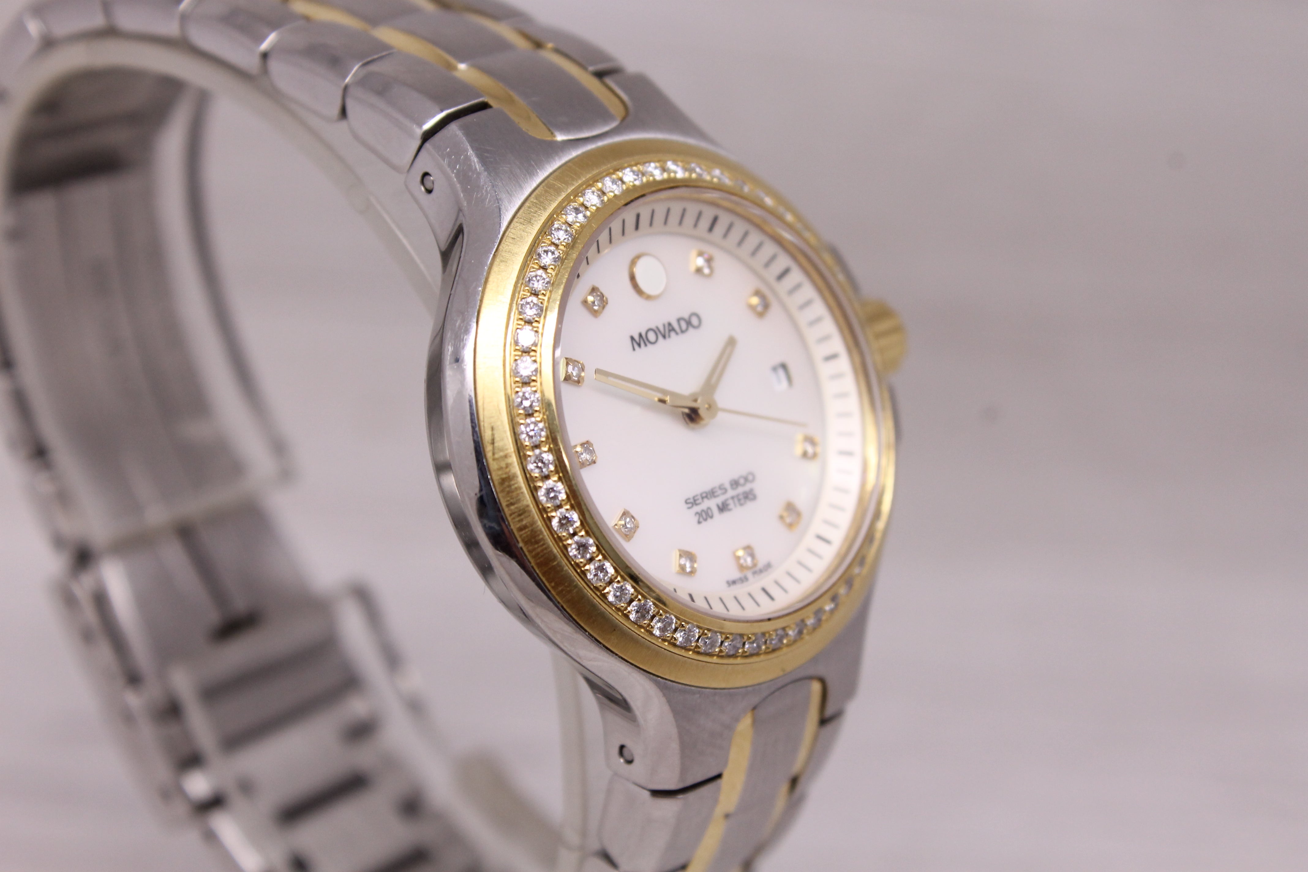Movado Ladies Series 800 Diamond Bezel MOP 30mm Watch Two-Tone Steel Quartz Date