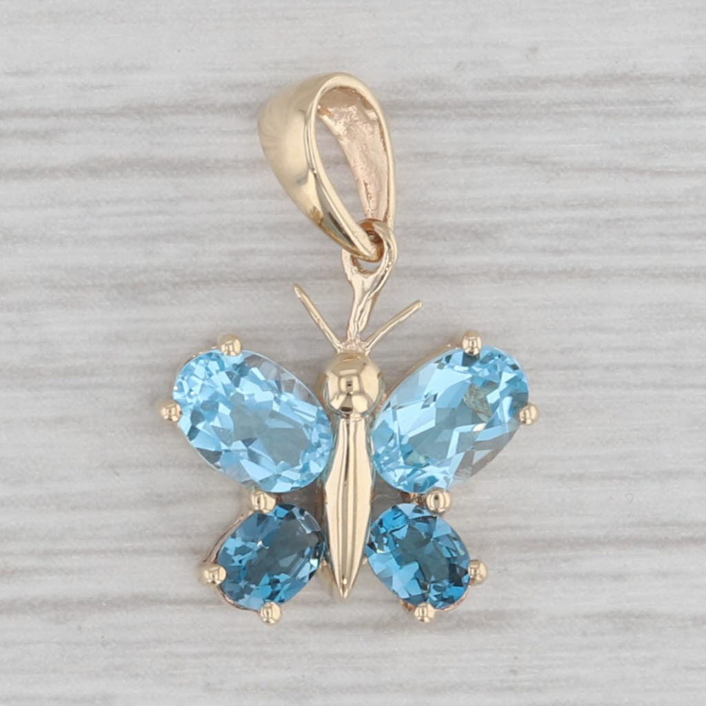 Gray 1.50ctw Blue Topaz Butterfly Pendant 10k Yellow Gold