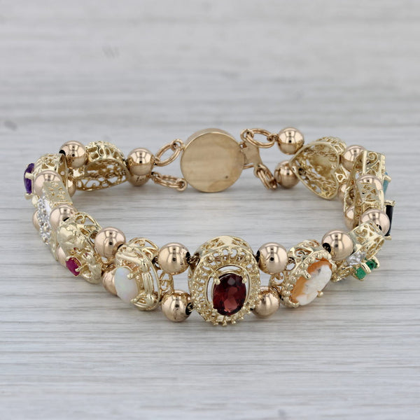 Gemstones Slide Charm Bracelet 10k Gold 7.25" Cameo Amethyst Emerald Topaz Opal