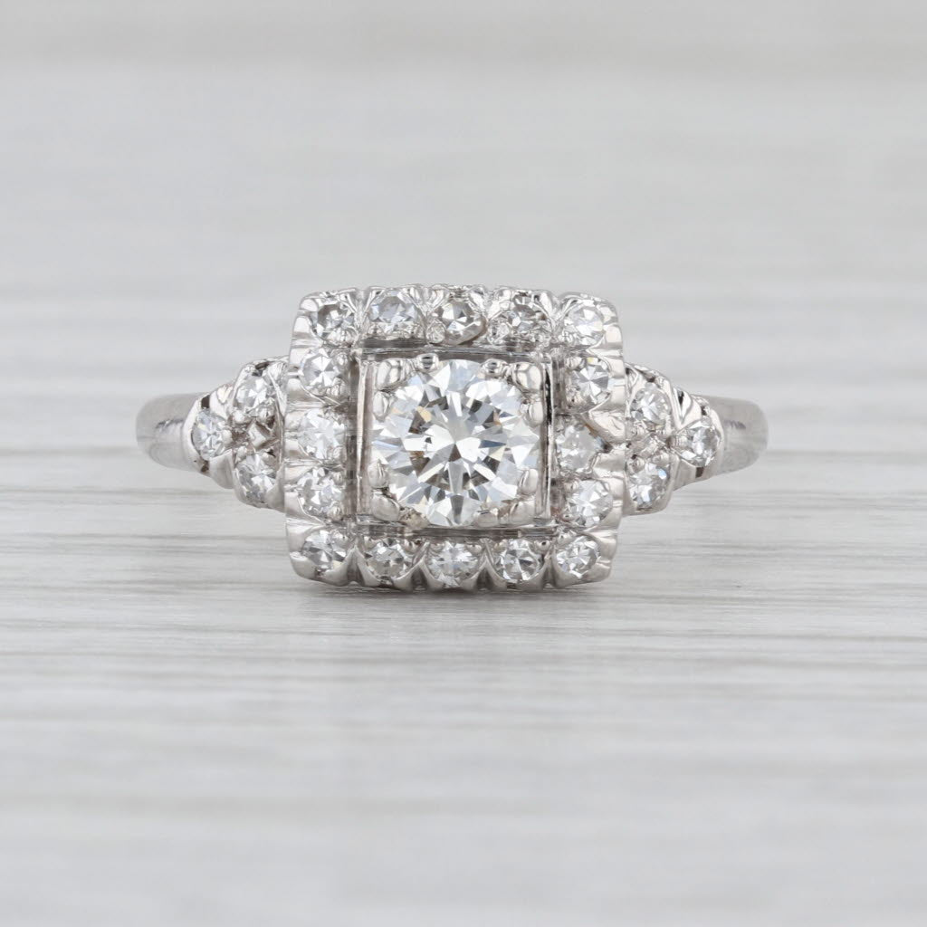 Vintage 0.70ctw Round Diamond Halo Engagement Ring Platinum Size 7.5