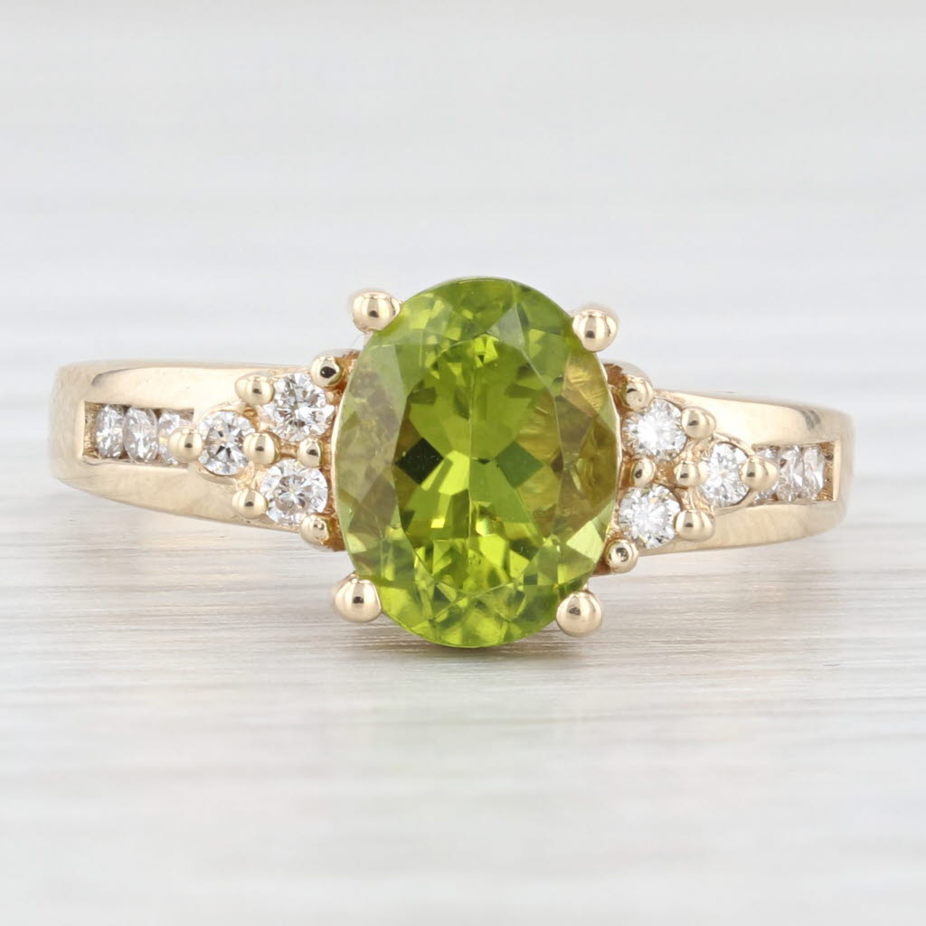 Light Gray 2.20ctw Oval Green Peridot Diamond Ring 14k Yellow Gold Size 7