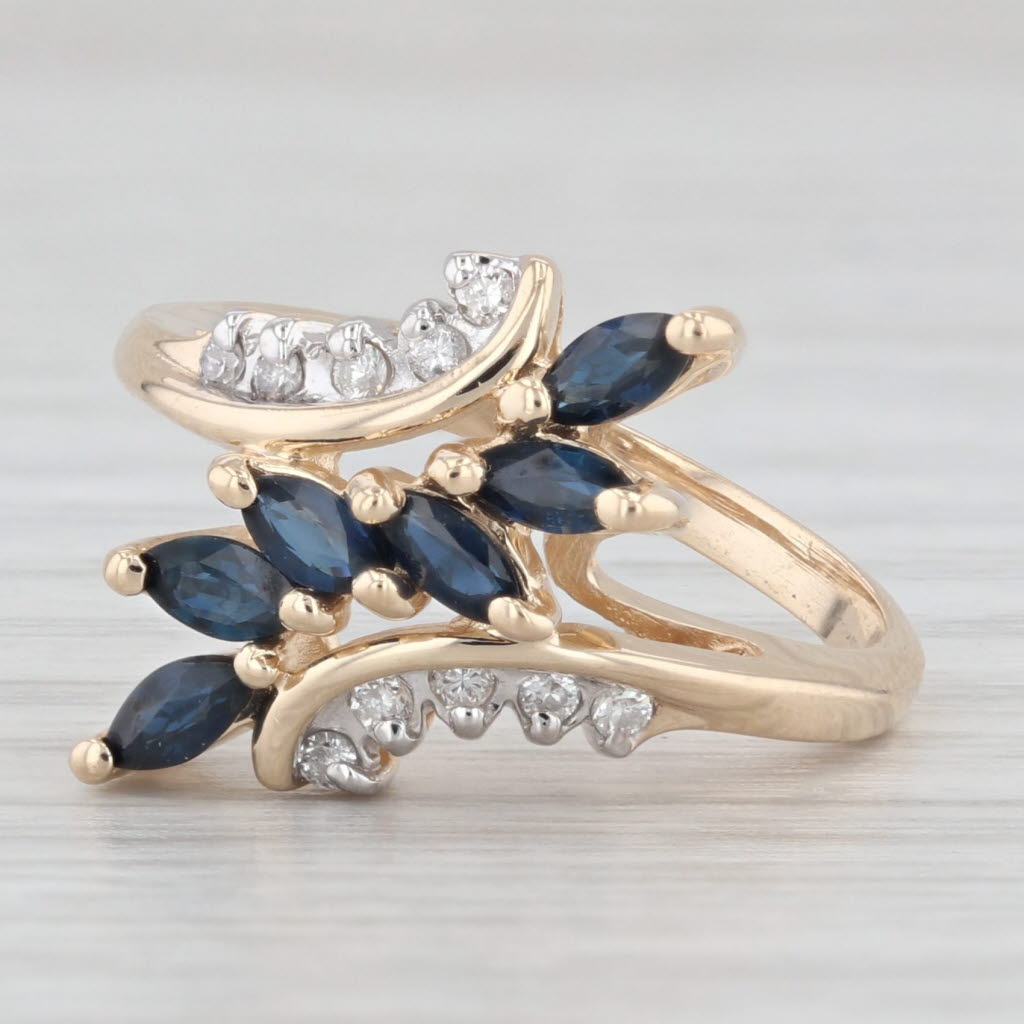 Light Gray 0.50ctw Blue Sapphire Diamond Bypass Ring 14k Yellow Gold Size 5.25