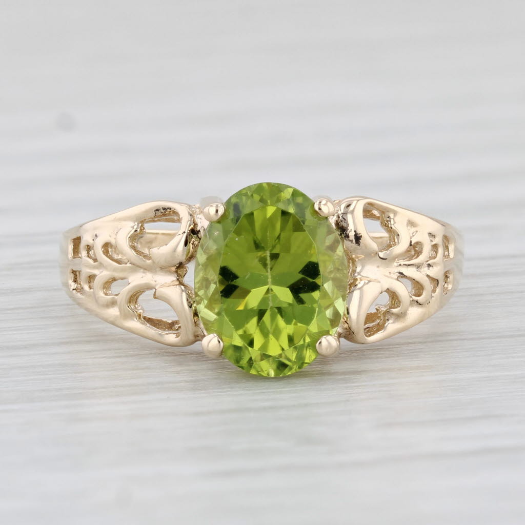 Light Gray 2.15ct Oval Peridot Solitaire Ring 10k Yellow Gold Size 8