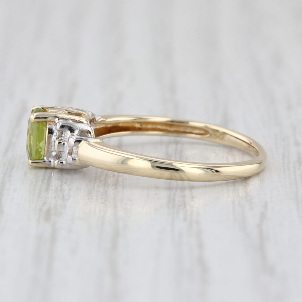 0.58ctw Oval Peridot Diamond Ring 10k Yellow Gold Size 7.25