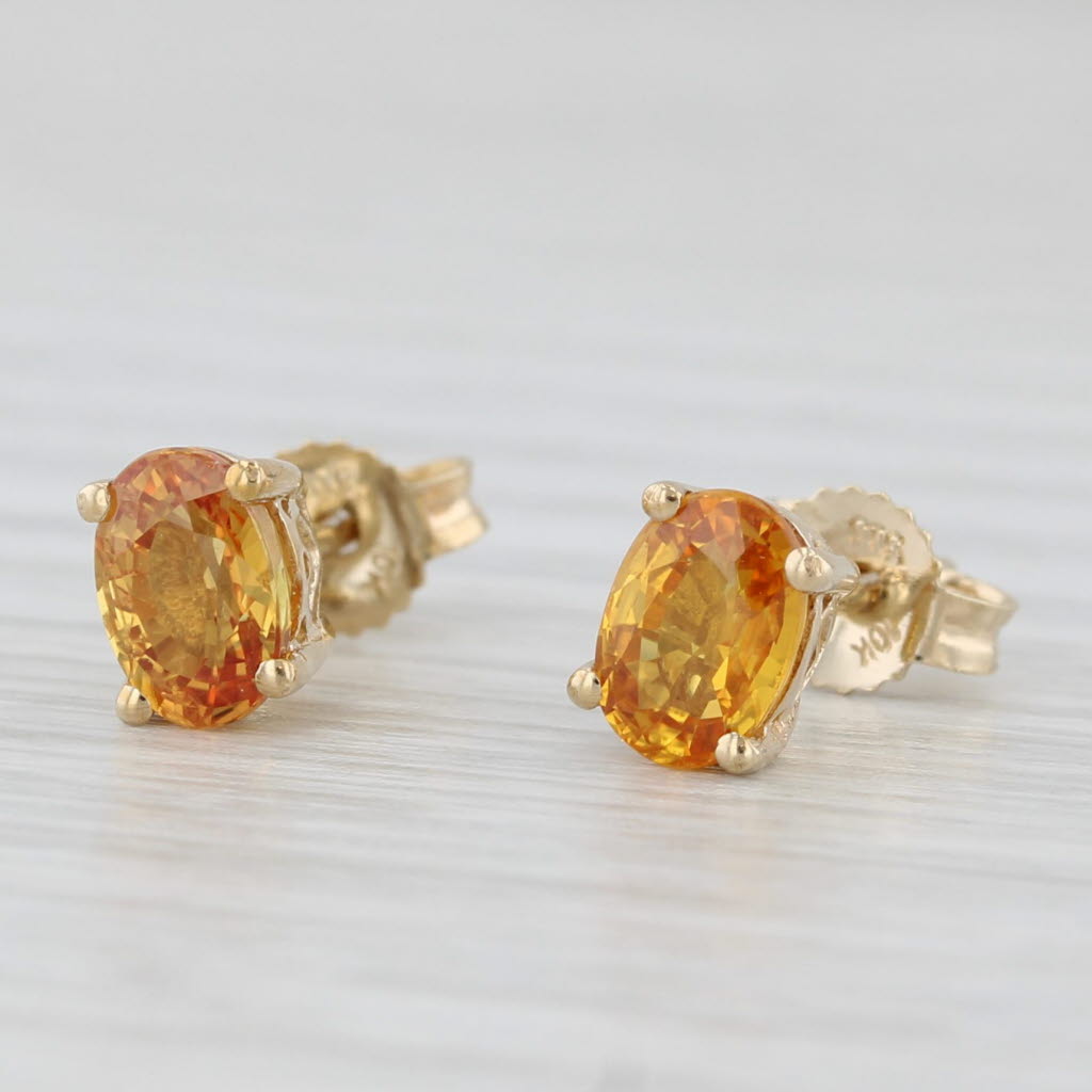 Light Gray 1.20ctw Oval Orange Citrine Solitaire Stud Earrings 10k Yellow Gold