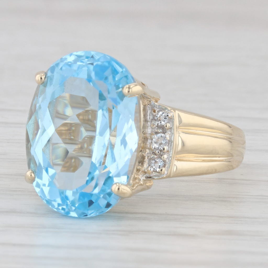 Light Gray 13.22ctw Blue & White Topaz Ring 9k Yellow Gold Large Oval Solitaire Size 7