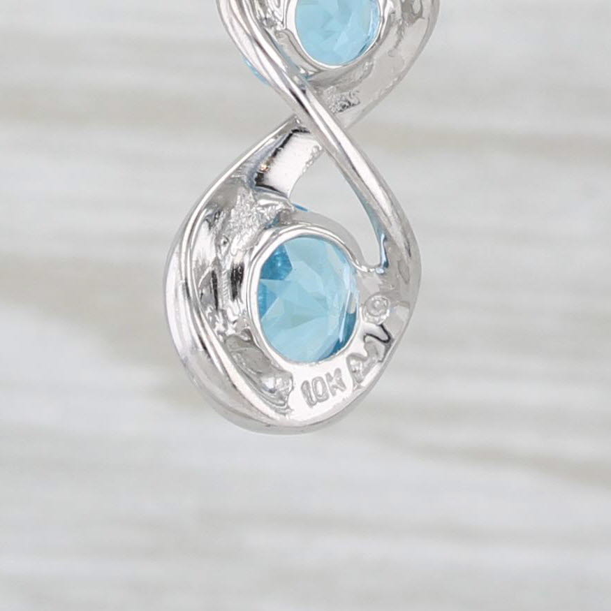 Light Gray 2.50ctw Blue Topaz Journey Dangle Earrings 10k White Gold Hook Post Drops