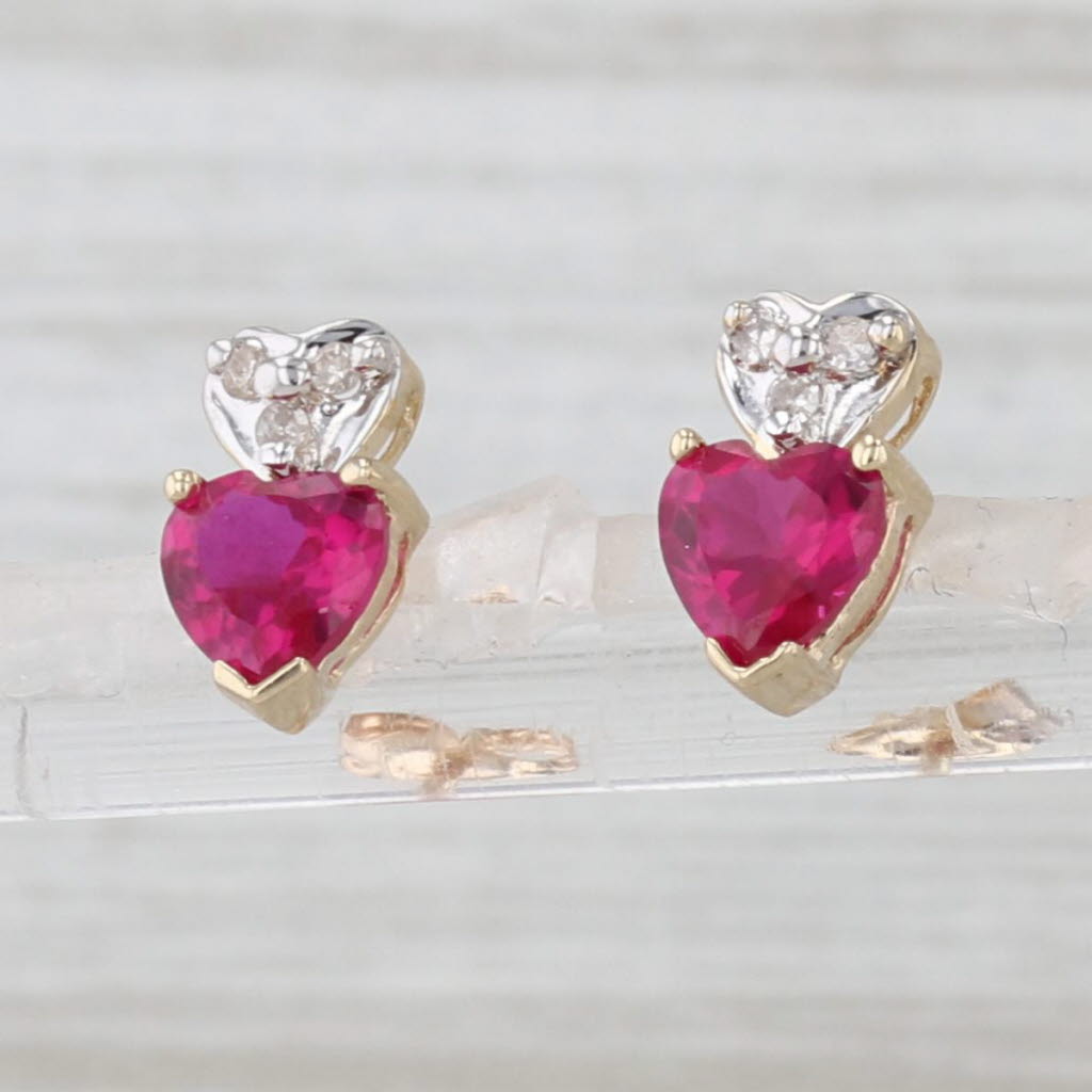 Light Gray 1.23ctw Lab Created Ruby Diamond Heart Stud Earrings 10k Yellow Gold