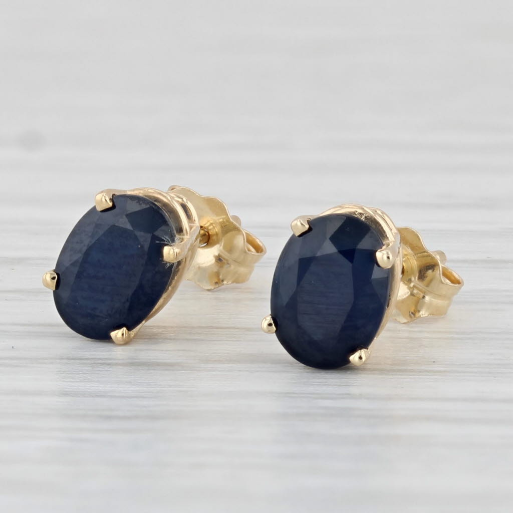 Light Gray 2ctw Blue Sapphire Stud Earrings 14k Yellow Gold Oval Solitaires