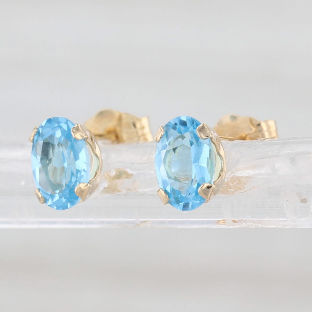 1ctw Oval Blue Topaz Solitaire Stud Earrings 14k Yellow Gold Studs