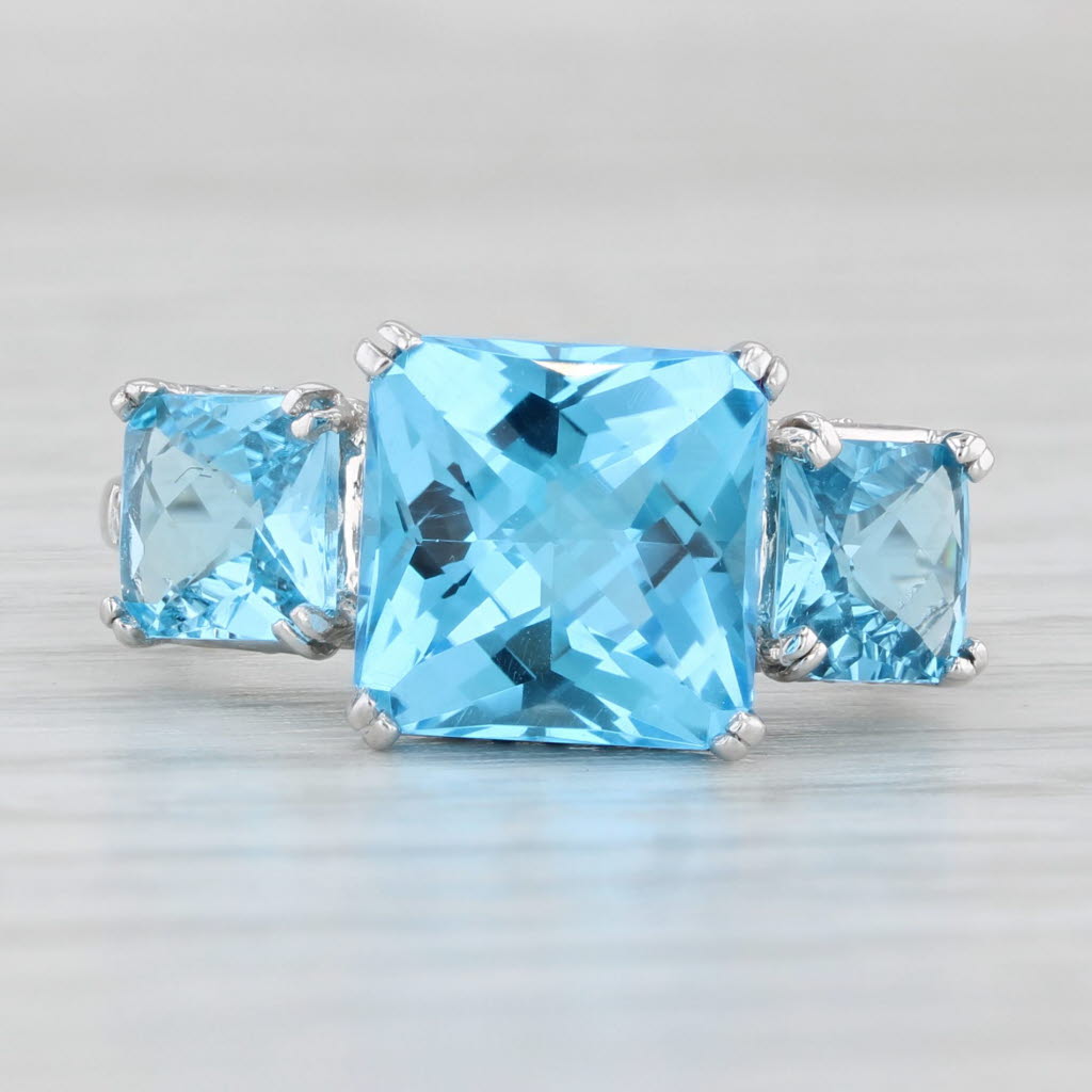 Light Gray 6.37ctw Blue Topaz 3-Stone Ring 10k White Gold Size 7 Diamond Accents