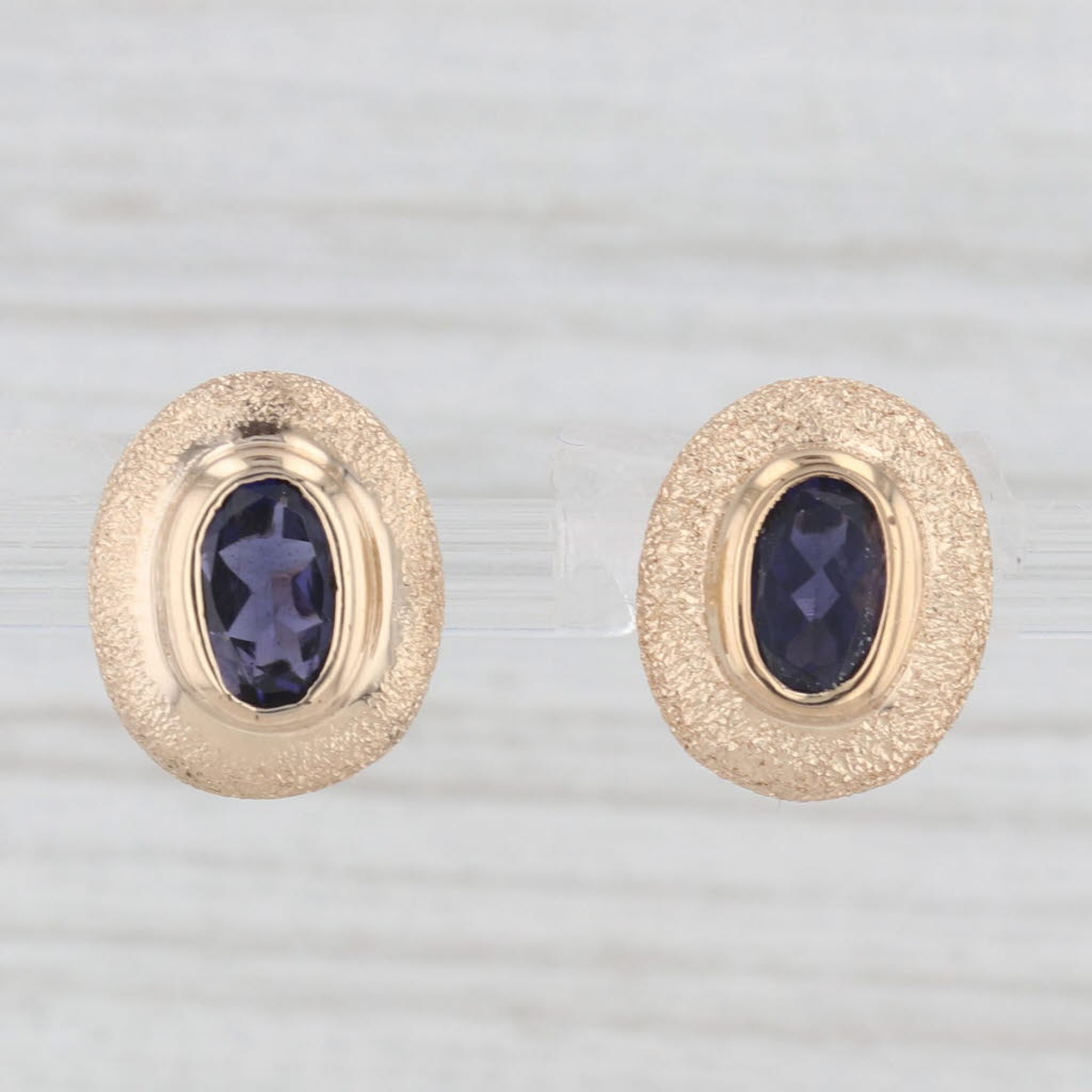 Light Gray 0.75ctw Oval Blue Iolite Stud Earrings 14k Yellow Gold