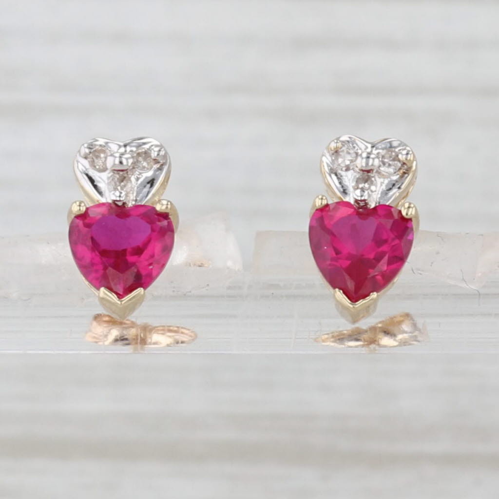 Light Gray 1.23ctw Lab Created Ruby Diamond Heart Stud Earrings 10k Yellow Gold