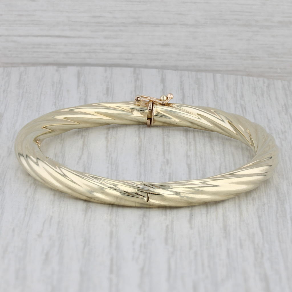 Gray Unoaerre Twisted Hinged Bangle Bracelet 14k Yellow Gold 7"