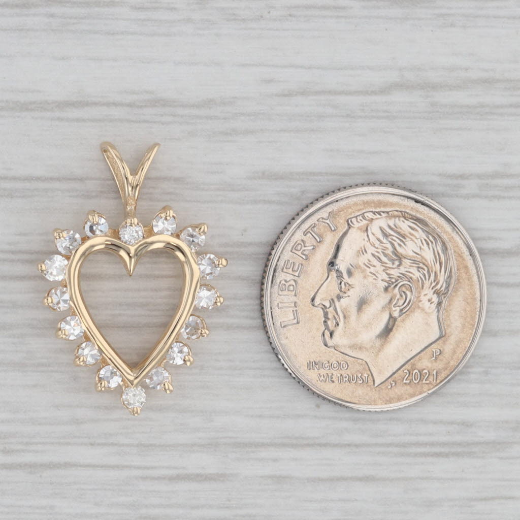 Gray 0.36ctw Diamond Halo Open Heart Pendant 14k Yellow Gold