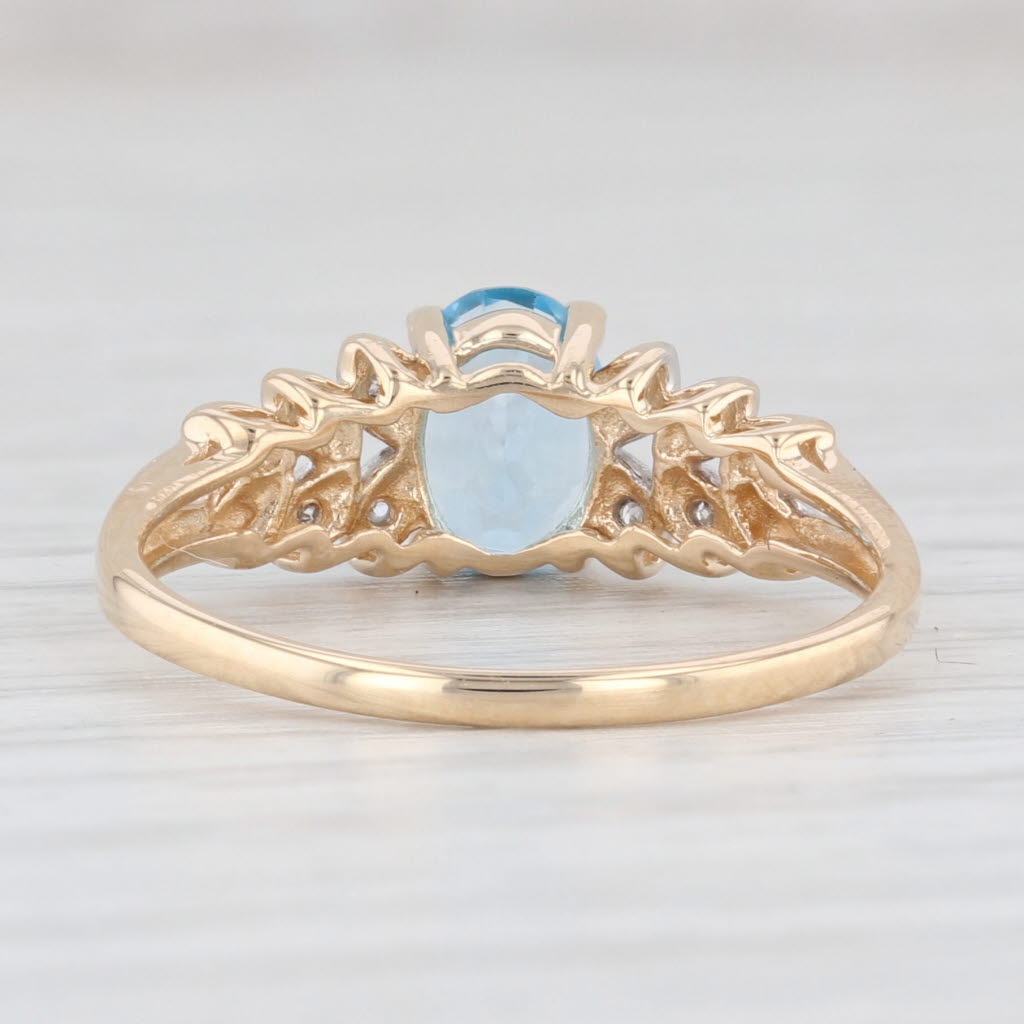 Light Gray 0.99ctw Oval Blue Topaz Diamond Ring 14k Yellow Gold Size 7