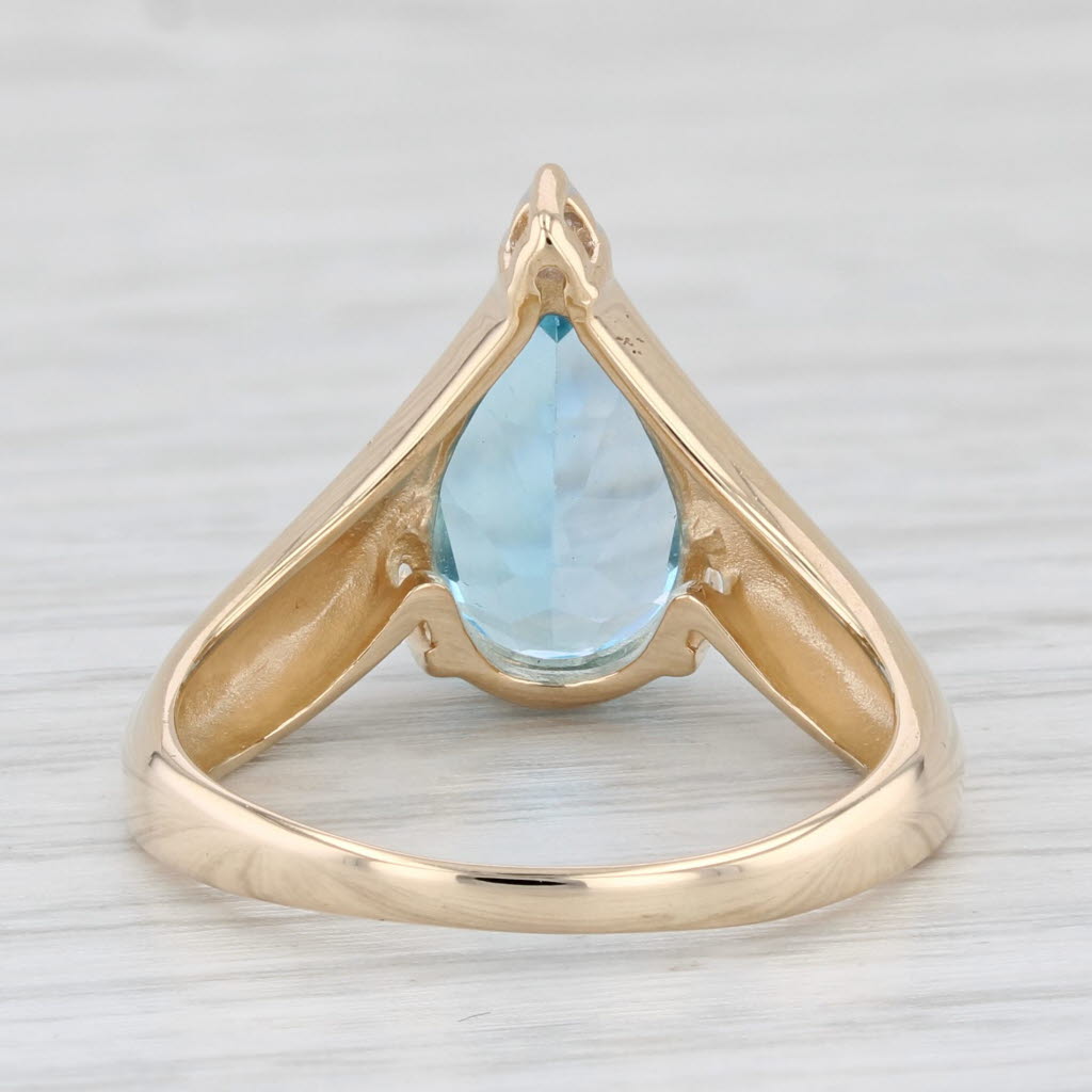 Light Gray 3.97ctw Pear Blue Topaz Diamond Ring 14k Yellow Gold Size 7.75