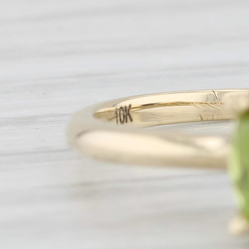 Light Gray 0.85ct Oval Peridot Solitaire Ring 10k Yellow Gold Size 6