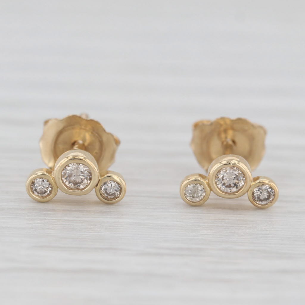 Light Gray New 0.15ctw Diamond 3-Stone Stud Earrings 10k Yellow Gold