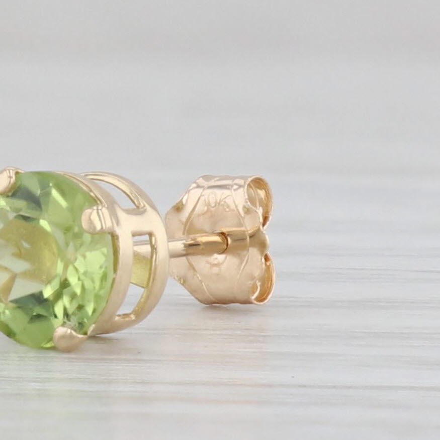 Light Gray 1.90ctw Round Peridot Stud Earrings 14k Yellow Gold August Birthstone