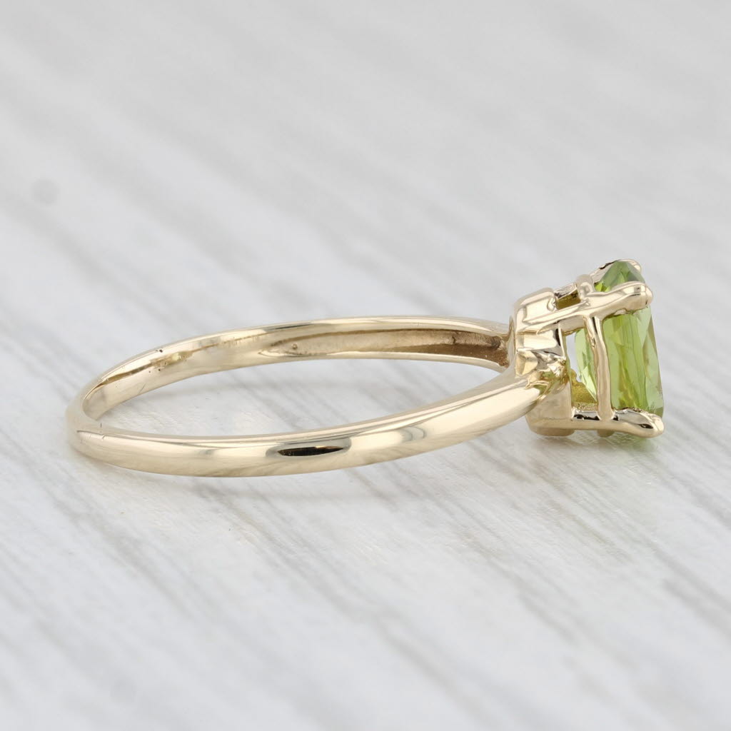 Light Gray 0.85ct Oval Peridot Solitaire Ring 10k Yellow Gold Size 6