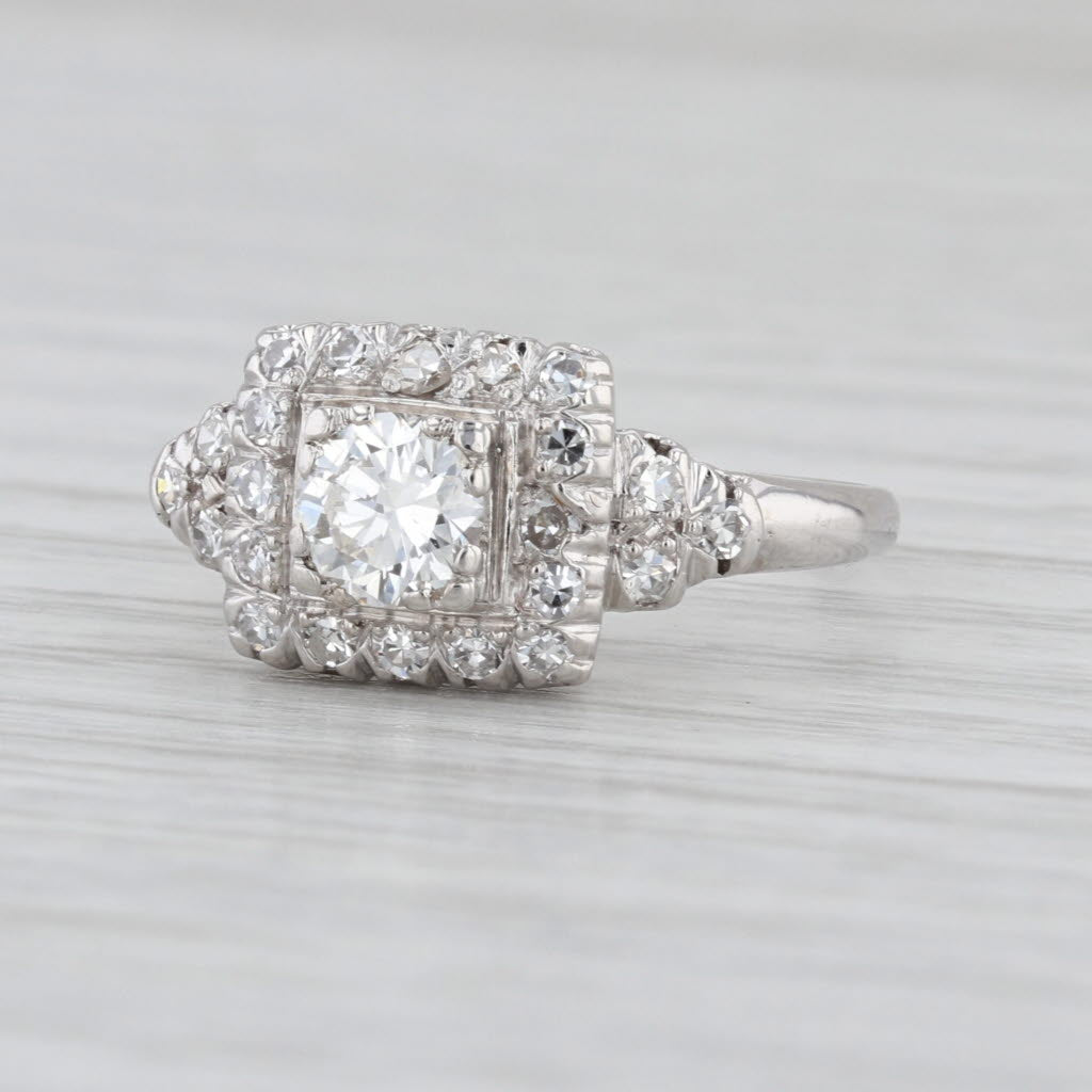 Vintage 0.70ctw Round Diamond Halo Engagement Ring Platinum Size 7.5